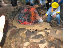 Recreation of ancient iron smelting process 